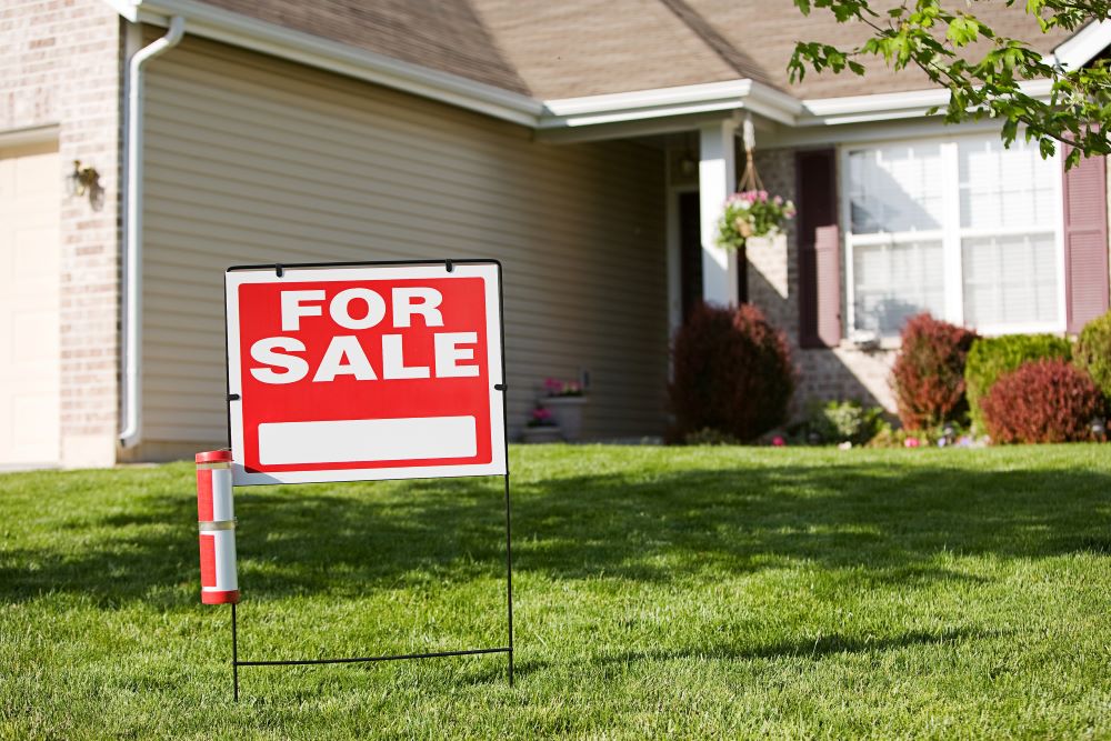 house with for sale sign