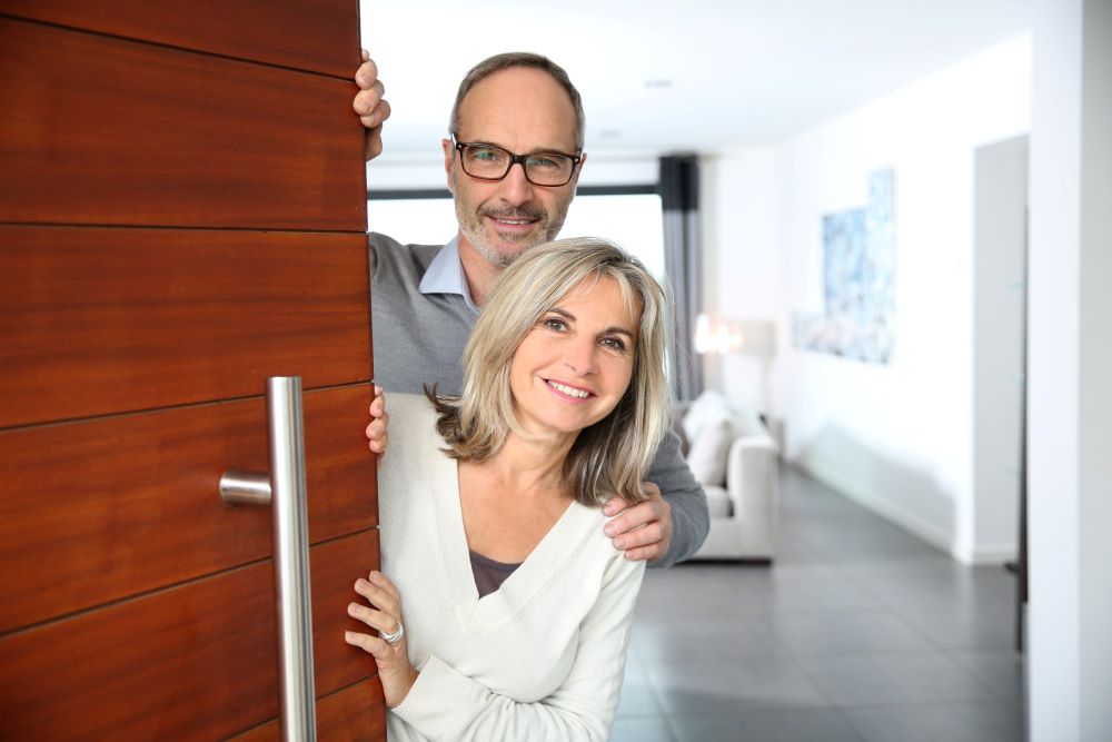 couple at open front door